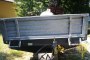 Single axle agricultural trailer with sides 4