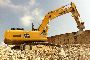 Excavadora de orugas, N.&ordm; 2 camiones hormigonera y veh&iacute;culo IVECO 1